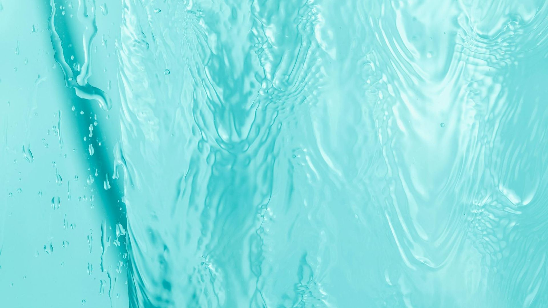 Abstract background with fluid lines of turquoise light.